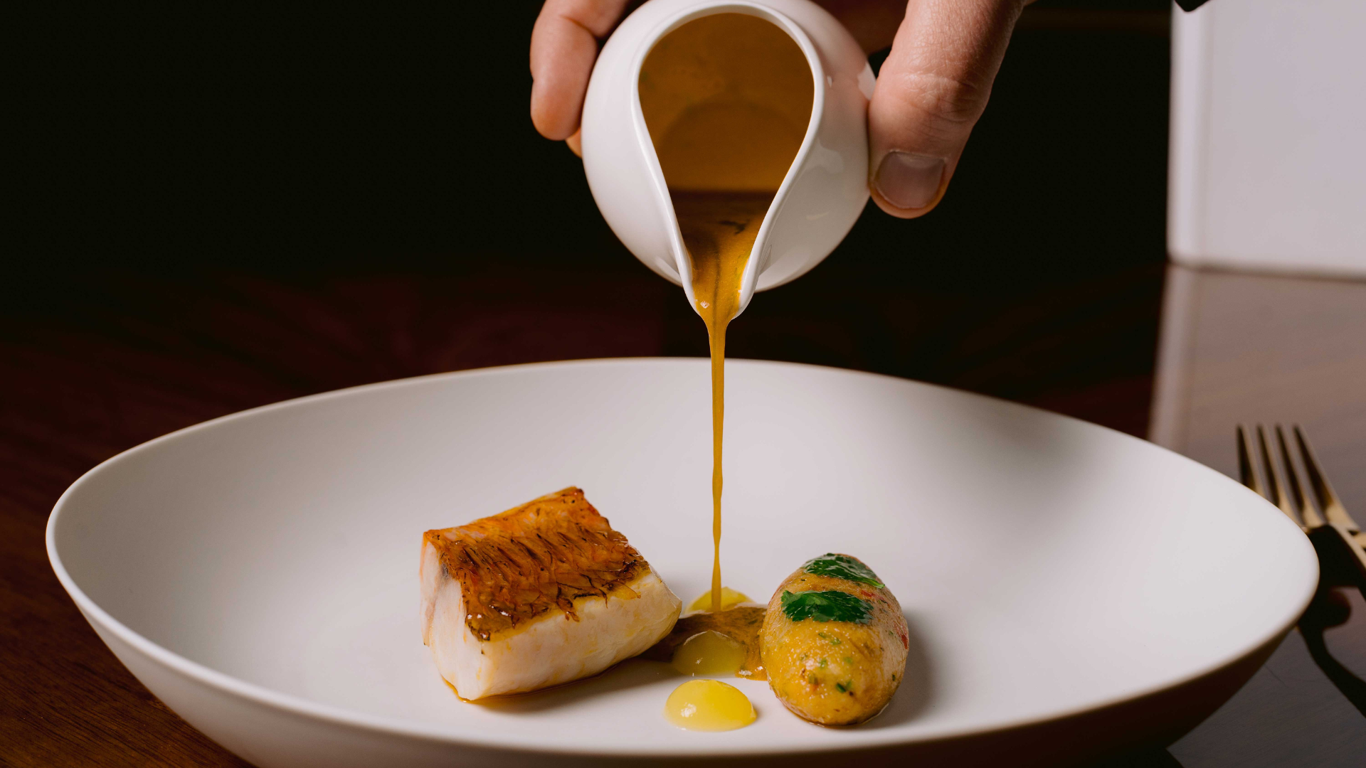 Vinha Restaurant at Vinha Boutique Hotel, featuring a fine-dining experience crafted by 2-star Michelin chef Henrique Sá Pessoa, with a sophisticated ambiance and exquisite Portuguese cuisine.