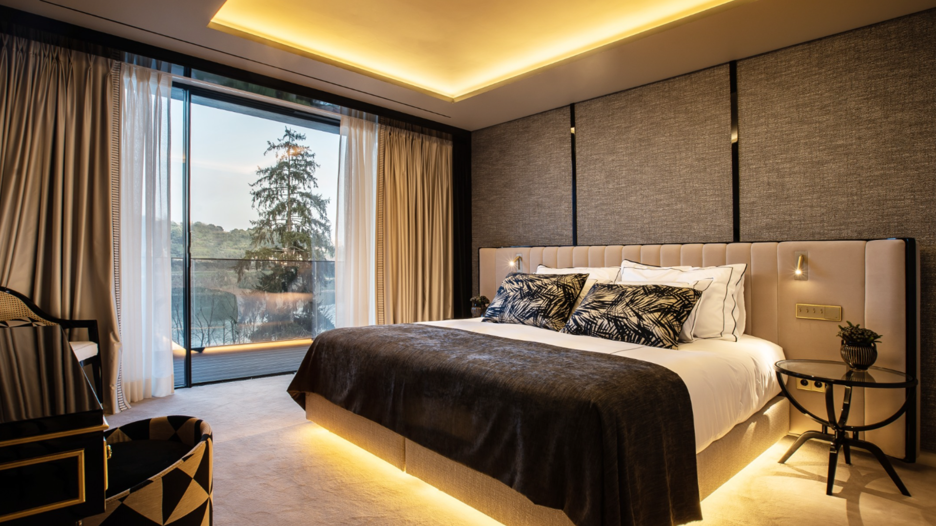 Elegant rooms at Vinha Boutique Hotel featuring unique designs, luxurious amenities, and a blend of traditional and contemporary decor, offering a sophisticated stay on the Douro River.