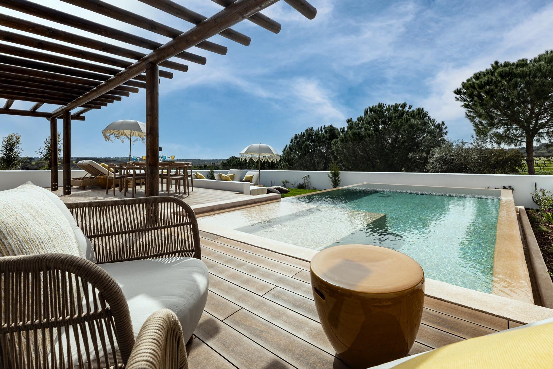 Outside area with a swimming pool at Herdade do Sobroso's Villas