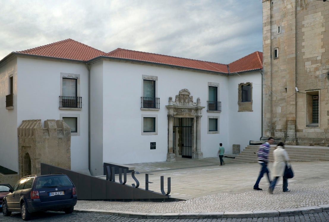 Exterior view of Museu Nacional de Machado de Castro in Coimbra, Portugal, displaying its grand neoclassical architecture and historical significance.