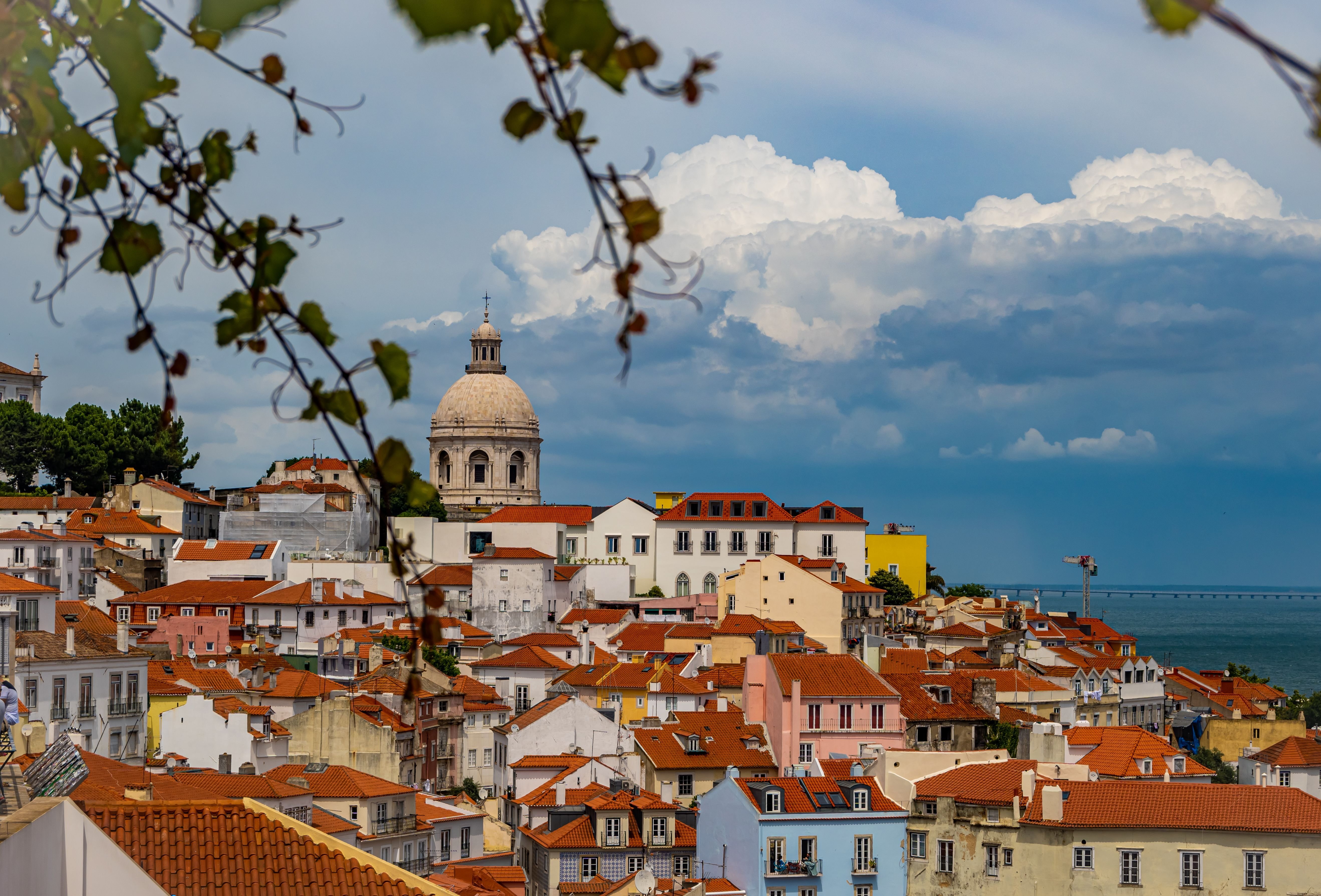 Aerial view of Alfama neighborhood surrounded by buildings