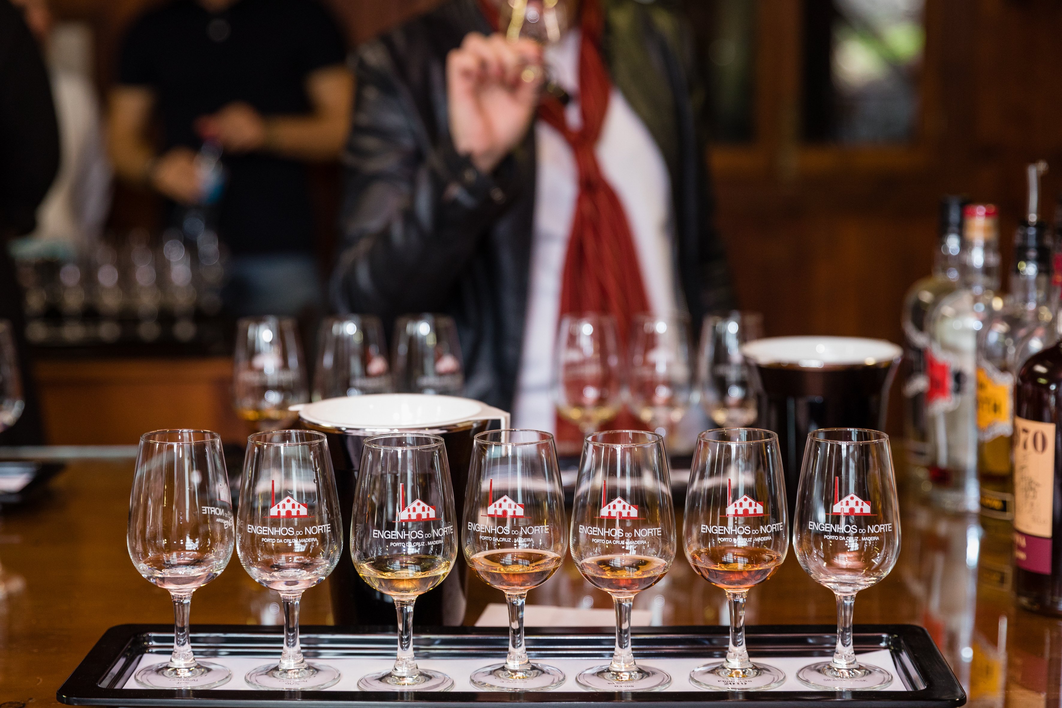 Rum Masterclass: Tasting five varieties of Madeira rum at Engenhos do Norte, with traditional sugarcane honey bread.