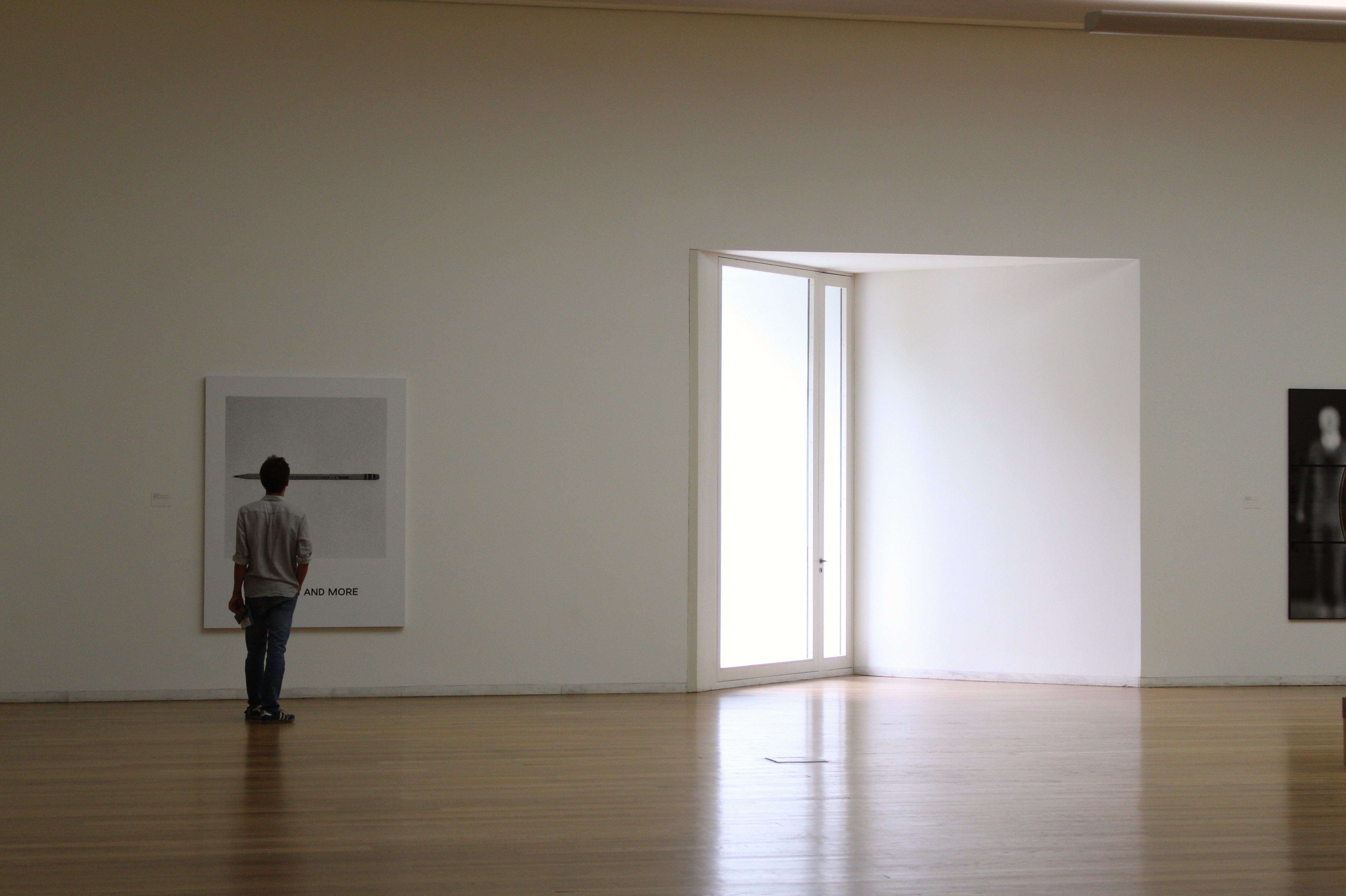 Photograph of the Serralves Foundation in Porto, Portugal, highlighting the modern and minimalist architectural design of the museum and its beautiful surrounding gardens